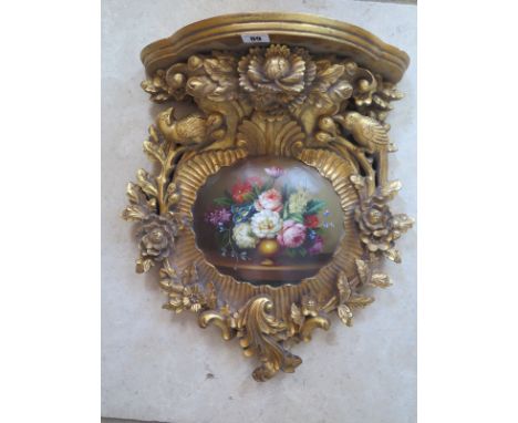 A Victorian style gilt bracket with painted cartouche - 51cm h x 45cm W 