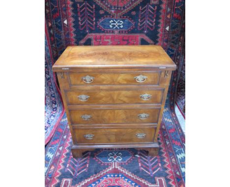 A good quality walnut bachelors chest with a fold over top, over four drawers on bracket feet - 62cm W x 32cm D x 76cm H - ma