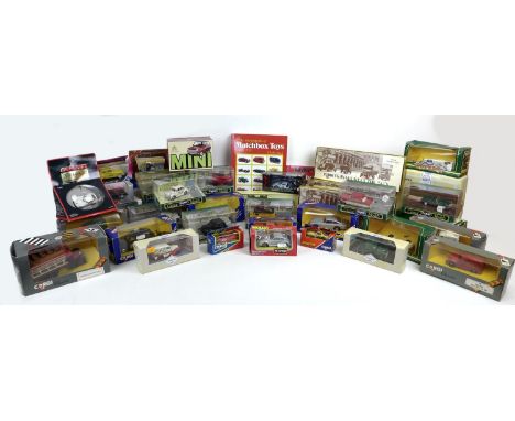 A collection of over thirty Corgi toys and other die cast model vehicles, including a limited edition Classic Fire Engine AEC