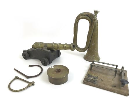 An assortment of military and related items, comprising a 1964 issue Mayers &amp; Harrison bugle, 27.5cm long, a WWII practic