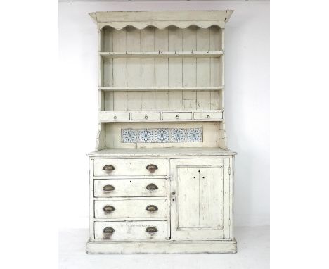 A Victorian painted pine Welsh dresser, the closed back with plate racks above with four inset spice drawers, the base sectio