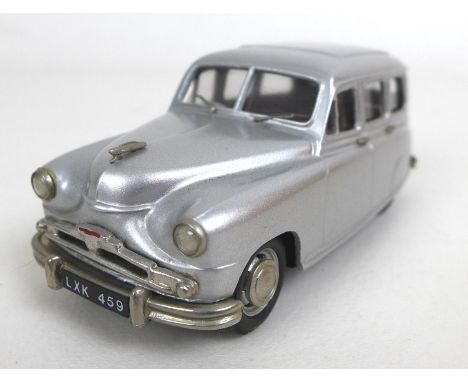 A Kenna Models die cast 1/43 scale classic car, a Standard Vanguard Estate in silver, with original box. 