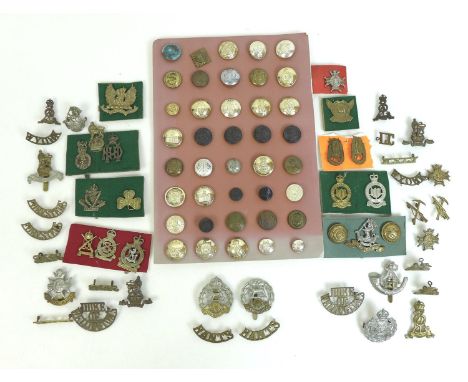 A collection of over eighty British army badges and buttons, including Hampshire and Royal Hampshire, Kent &amp; County of Lo