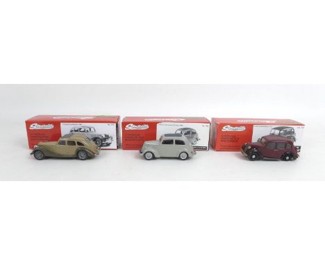 Three Somerville Models 1/43 scale die cast classic cars, a Ford Popular E103 in grey, a Riley Kestrel in tan brown with deta