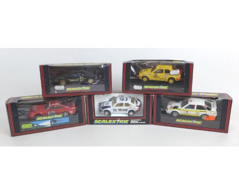 Five Scalextric racing car models, comprising a BMW M1 (C347), an Audi Quattro (C349), a Bardahi XR3i (C126), a Mobil XR3i (C