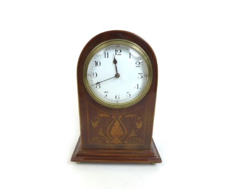 An Edwardian mahogany mantle clock, the domed topped case with decorative marquetry inlay, white Arabic dial, 8 day movement,