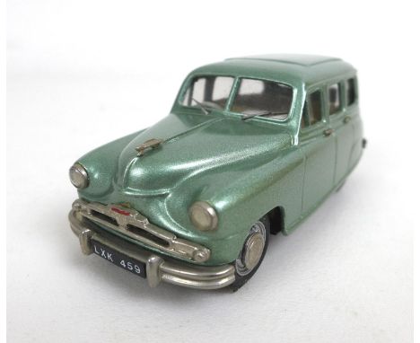 A Kenna Models die cast 1/43 scale classic car, a Standard Vanguard Estate in green, with original box. 