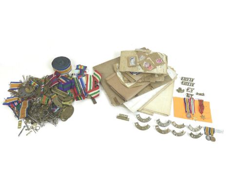A collection military ephemera, fifteen British army shoulder tags mostly for Yorkshire regiments, a 1948 War Office map of G