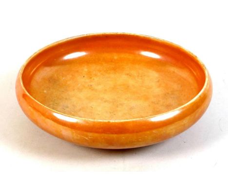 An Art Deco Royal Doulton ceramic bowl, decorated in orange lustre glaze, black printed factory mark and impressed 'Doulton' 