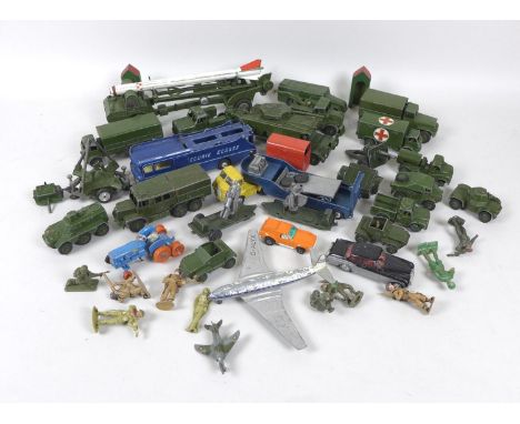 A group of seventeen Dinky Toys and Corgi die-cast metal military models, including a Dinky Supertoys Centurian, a Medium Art
