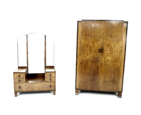 An Art Deco Waring and Gillow Ltd gentleman's dressing table and wardrobe, the walnut veneer with rosewood crossbanding, make