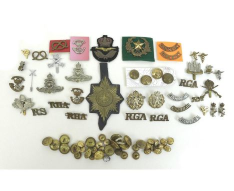 A collection of over seventy British army, RAF badges and buttons, including a Coldstream Guards brass valise badge, a pair o