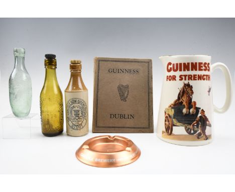 Breweriana including a large ceramic "Guinness for Strength" jug, a stoneware "The Carlisle New Brewery Co Ltd" stout beer bo