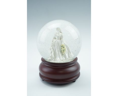 A Compton and Woodhouse Diana, The Princess of Wales musical snow globe, 16 cm high, with certificate, playing "Candle in the