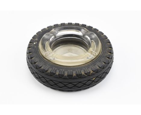 A vintage Goodyear rubber and glass promotional counter top ashtray in the form of a tyre, 15 cm