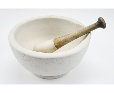 A vintage porcelain mortar and pestle, latter 22 cm