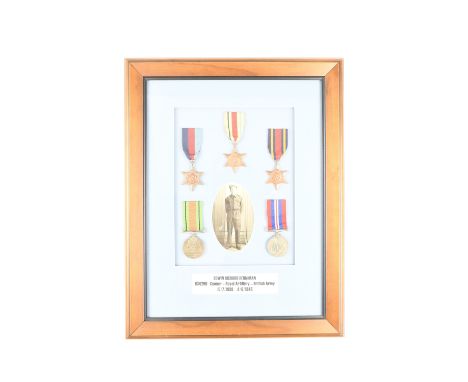 A framed Second World War campaign medal group including Burma Star, with portrait photograph, that of 934200 Gunner Edwin Ri