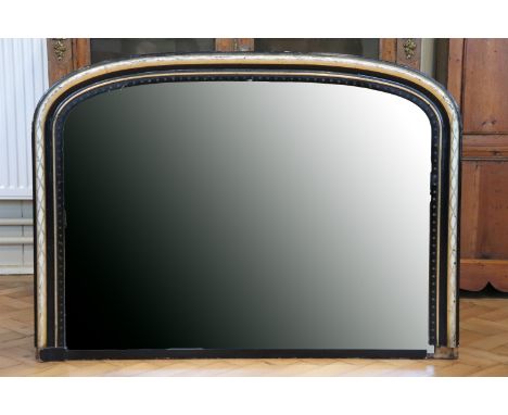 A Victorian ebonised and parcel gilt overmantle mirror, the arched frame decorated with incised silver gilding, (a/f), 80 x 1