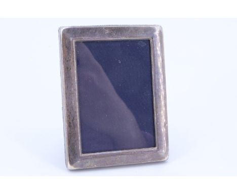 A late 20th Century silver-faced photograph frame, 10.5 cm x 8 cm