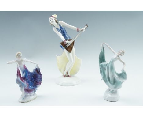 A Goebel figurine of a 1920s Jazz Age musician or dancer with balalaika, the base having printed mark 'F.F. 31', together wit