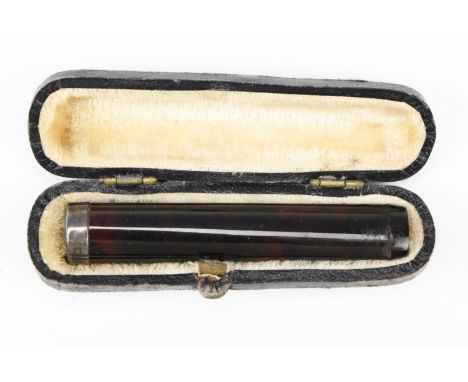 An early 20th Century silver mounted Bakelite cheroot holder, in fitted case, assay marks indistinct, holder 6.5 cm