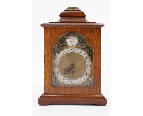 A 1980s mahogany mantle clock, having a drum movement with a lever escapement, in a bracket clock style case, 22.5 cm excludi