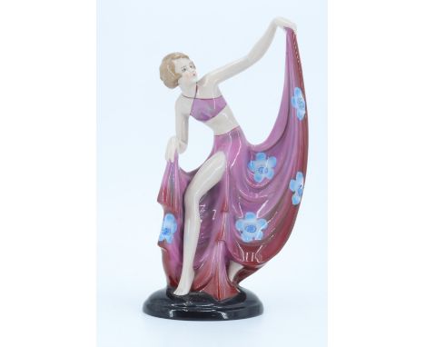 A 1930s Art Deco ceramic figurine of a dancer in the manner of Goldscheider's figures designed by Joseph Lorenzel, the base b