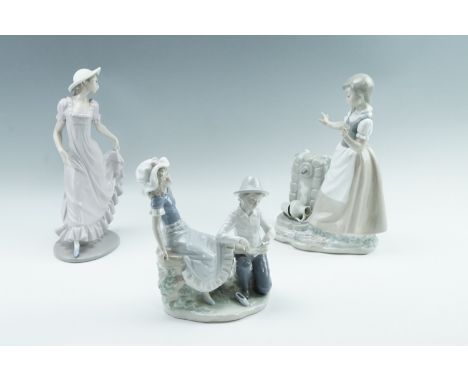 Three large Nao figurines, comprising Tenderness and others, tallest 30 cm