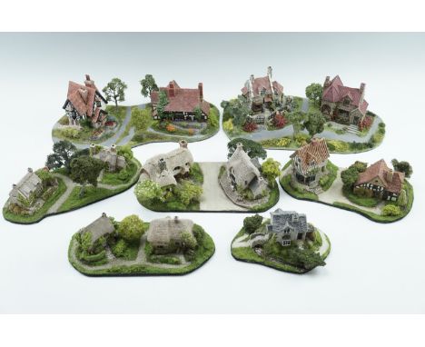 Seven N scale model railway buildings