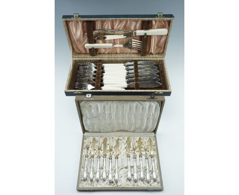 Vintage cased sets of cutlery including fish servers, fish knives and forks, with a cased fruit set and spoons