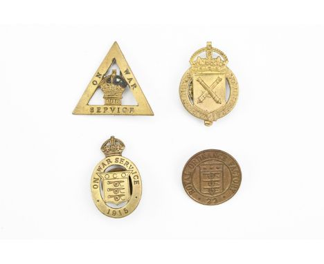 Four various Ordnance factory worker badges