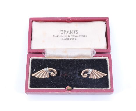 A pair of vintage 9 ct yellow metal ear clips, each being of five tapering reeds, gathering to a scroll, accentuated with whi