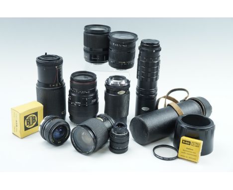 A group of camera lenses, including a cased Optomax Telephoto 200 mm, a Bell &amp; Howell Macro 75-260 mm, a Bell &amp; Howel