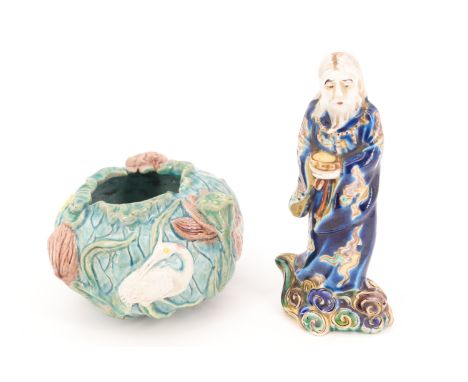 A Chinese ceramic figure of an immortal, together with a naturalistic design glazed ceramic bowl, former 13.5 cm