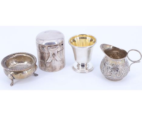 Sundry items of small silver comprising a Victorian cream jug, a salt cellar, a spirit heater / burner case and a shot beaker