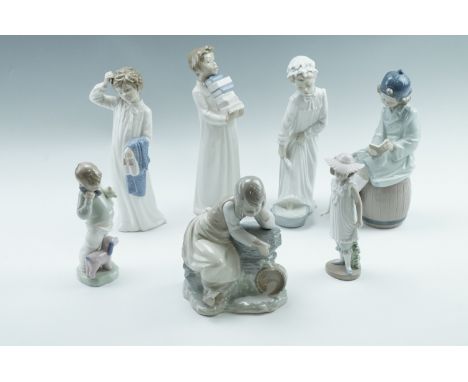 Seven Nao figurines, comprising reading time, bedtime etc, tallest 28 cm 