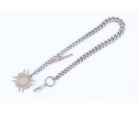 A late 19th / early 20th Century silver graded curb link watch chain, having a base metal T-bar, swivel and fob, 33 cm, 59 g 