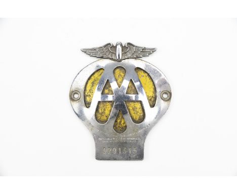A vintage chrome AA bumper badge, No. OP91315