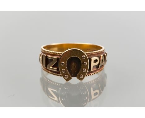 EIGHTEEN CARAT GOLD 'MIZPAH' RING
with 'Mizpah' spelled to either side of a horseshoe, hallmarked