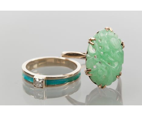 EARLY TWENTIETH CENTURY CARVED JADE RING
carved in a floral design, in nine carat gold, along with an enamel and diamond ring