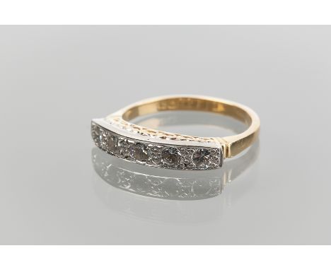EARLY TO MID TWENTIETH CENTURY DIAMOND SET RING
with five round diamonds in platinum, on an eighteen carat gold shank