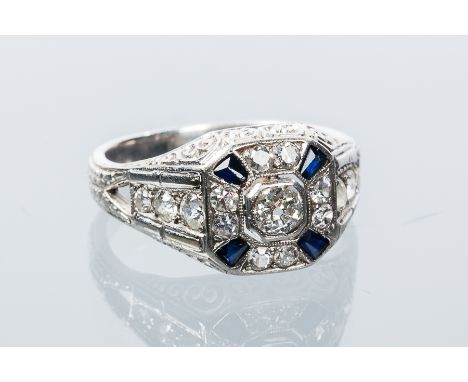 ART DECO SAPPHIRE AND DIAMOND RING
the square shaped bezel set with a central old cut diamond, surrounded by further old cut 