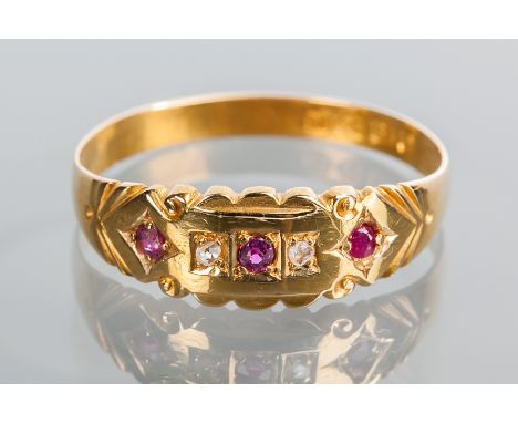 VICTORIAN RUBY AND DIAMOND RING
the ornate bezel set with alternating rubies and diamonds, in eighteen carat gold with full C