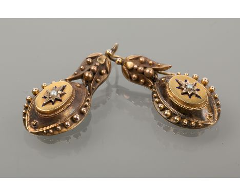 PAIR OF VICTORIAN DROP EARRINGS
each with an oval drop with central pearl set star motif, the border with overlaid spherical 