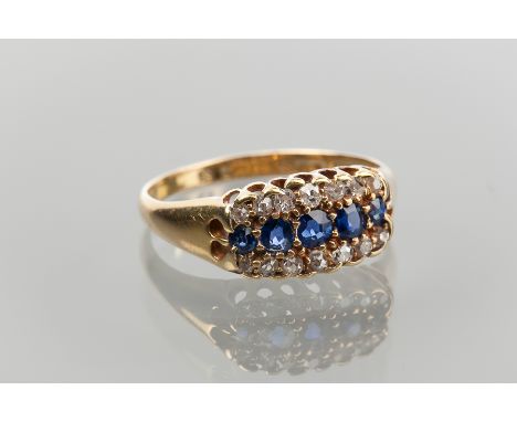 VICTORIAN SAPPHIRE AND DIAMOND RING
set with a central row of graduated sapphires, flanked by two rows of diamonds, in eighte