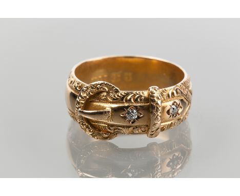 GENTLEMAN'S VICTORIAN DIAMOND SET BELT MOTIF RING
set with two diamonds, in eighteen carat gold, Birmingham marks, 7.9mm wide