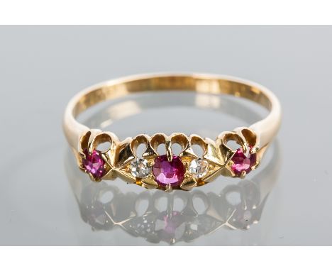 VICTORIAN RUBY AND DIAMOND RING
set with alternating rubies and diamonds in a bezel with pierced gallery, hallmarks worn, in 