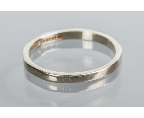 EIGHTEEN CARAT GOLD WEDDING BAND
hallmarked, decoration worn, size R