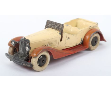 Scarce Dinky Toys Pre-War 24g Sports Tourer Four-Seater, type 2 criss-cross chassis, cream body, brown chassis (faded) filled