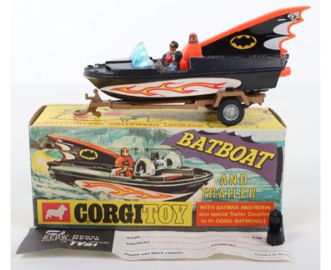 Corgi Toys 107 Batboat And Trailer, 1st issue with tinplate fin cover, complete with Batman &amp; Robin figures, gold trailer